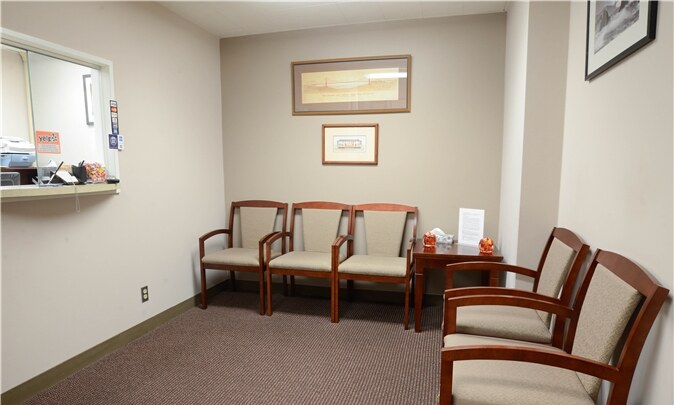 Waiting area with upholstered chairs at the San Francisco office